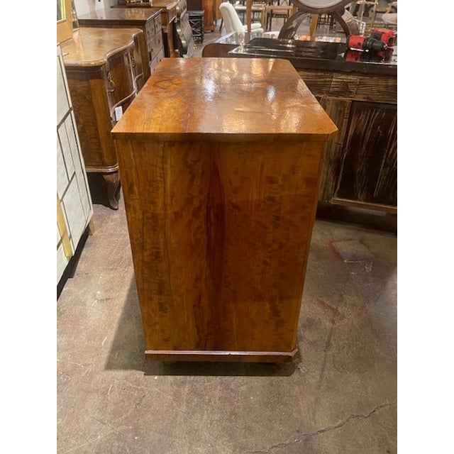 The 19th c. Biedermeier Black Walnut Chest is a stylish and elegant piece of furniture perfect for any home décor. This...