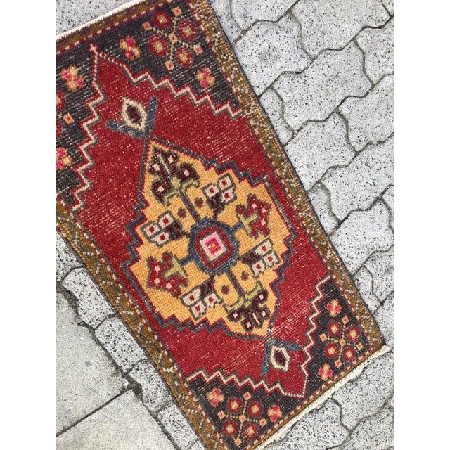 This is a vintage Turkish Oushak rug from the 1960s. The piece was hand-knotted.
