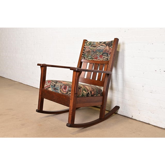 A gorgeous antique Mission or Arts & Crafts period rocking chair In the manner of Stickley Brothers By J.M. Young & Sons...
