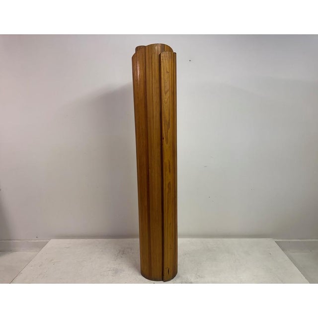 A sculptural pine folding screen produced by Baumann Fils et Cie, Melun-Paris, France, circa 1940s. Formed from a series...