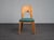 A refined set of six dining chairs produced by koefoed danmark in denmark during the 1990s. The design combines solid...