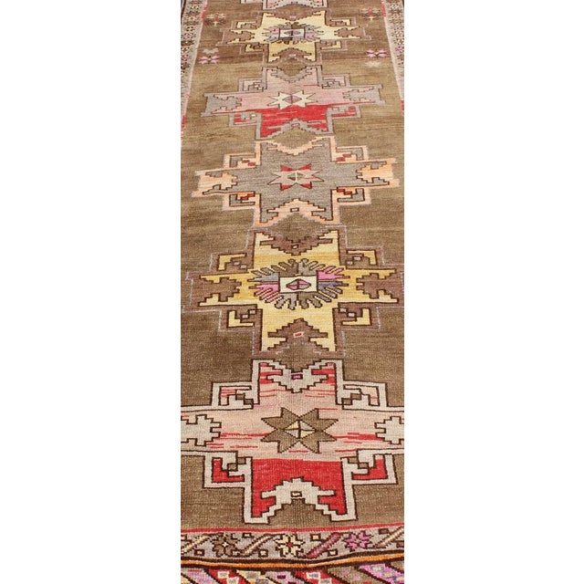 Vintage Turkish Kars Runner With Brown, Red, Yellow, and Soft Pink Tones For Sale - Image 4 of 13