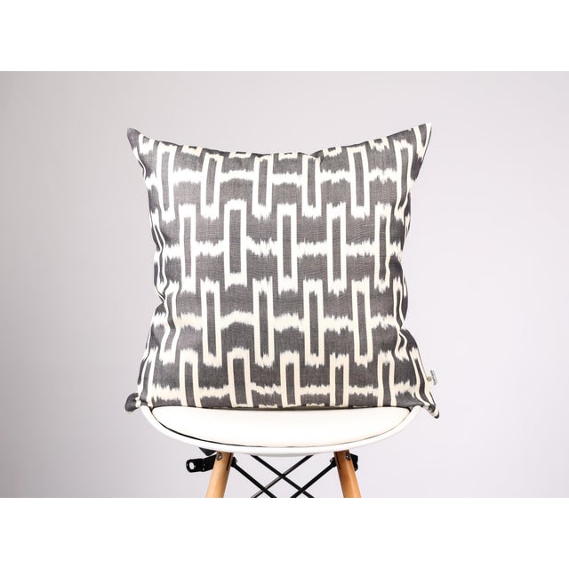 Authentic Handmade Uzbek Ikat Pillow Cover — Crafted in Margilan, Uzbekistan Bring timeless craftsmanship and rich...