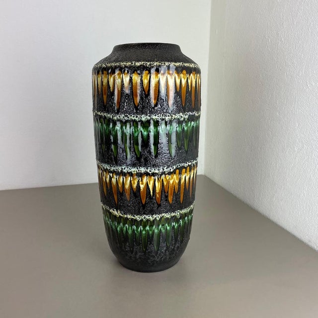 Article: Fat lava art vase, heavy Brutalist glaze Producer: Scheurich, Germany Decade: 1970s This original vintage vase...