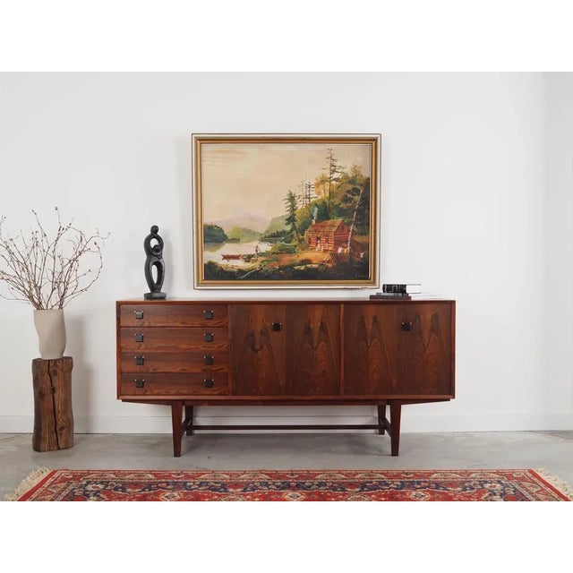 The painting was made using oil on canvas technique in the 1980s. The frame was made of wood. The painting is maintained...