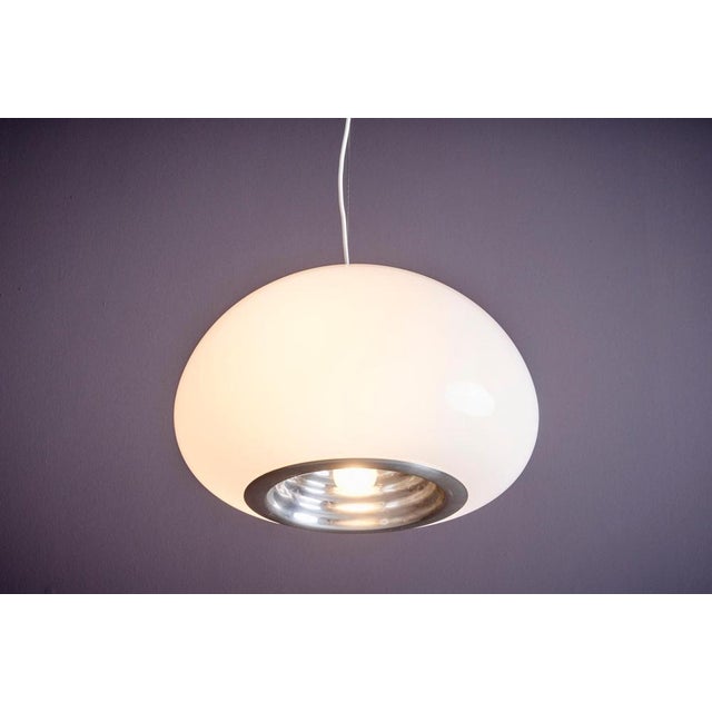 New old stock Flos Pendant lamp with opal glass bowl for diffused light. For concentrated light a polished aluminium...