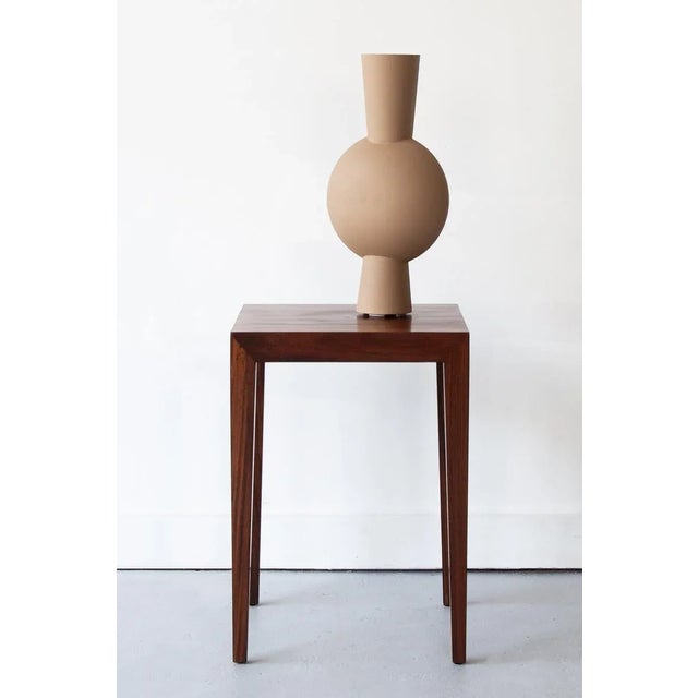 An ideally sized side table in solid rosewood, designed by Severin Hansen and produced by Haslev Møbelsnedkeri throughout...