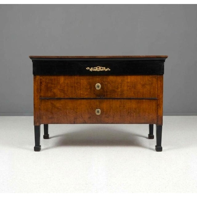 The Emanation of Eighteenth-Century Elegance in Your Living Room Furthermore, owning a pair of Directoire-style chests...