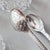1930s Antique Set of 12 demitasse spoons and sugar tongs in original satin-lined case // hostess gift // coffee service // rococo // shell motif For Sale - Image 5 of 18