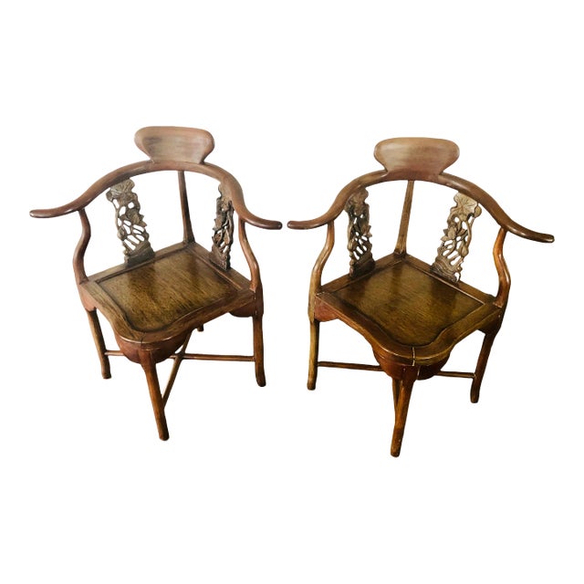 Late 19th Century Pair of Antique Hand Carved Asian Style Corner Chairs With Removable Blue Cushions For Sale