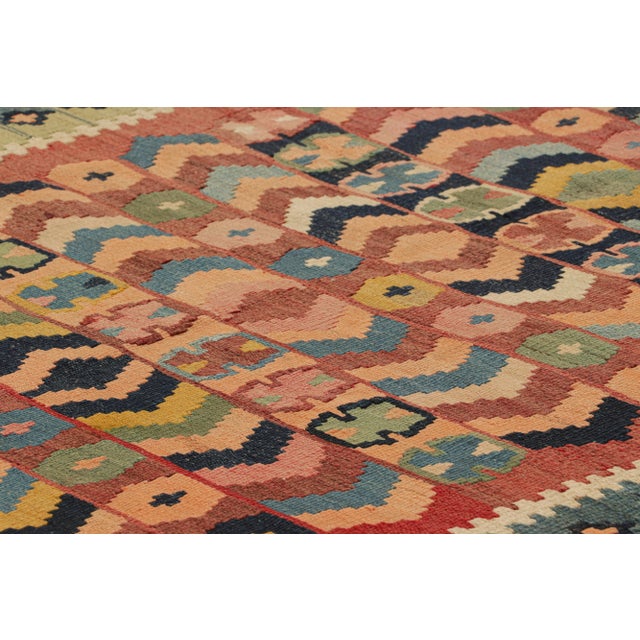 Handwoven in wool, circa 1950-1960, this 4x8 vintage Turkish kilim, is a collectible piece featuring polychromatic...