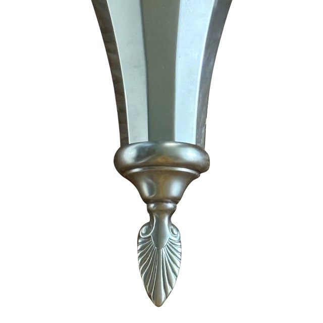 Pair of Art Deco Torchieres Scalloped and fluted wall sconces with an art deco feel. 13.5” h x 11.5” w x 7.5” d
