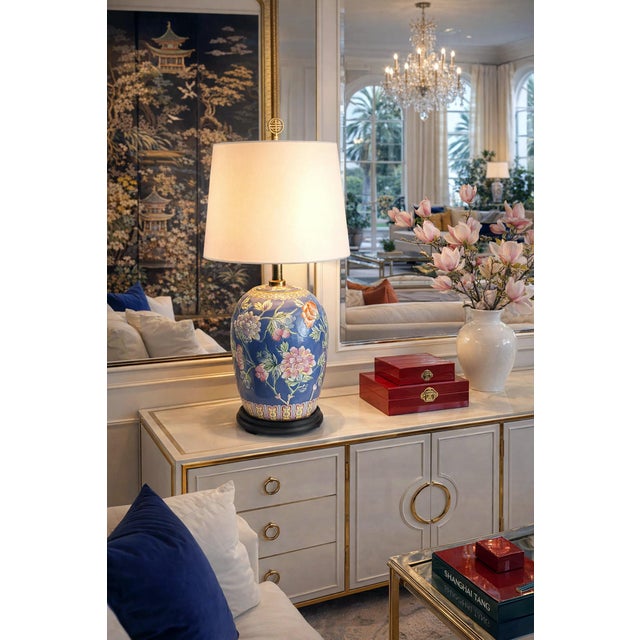 Offering a RESTORED Chinese porcelain hand painted table Lamp with heavy textured glaze, circa Mid 20th Century. The...