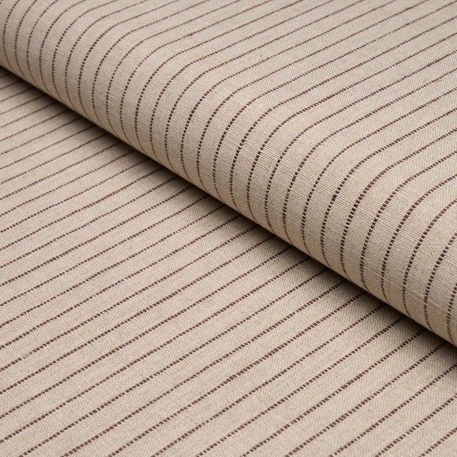 Featuring slightly irregular narrow stripes, Theo Stripe is a soft, lightweight woven made of 100% linen. Subtle texture...