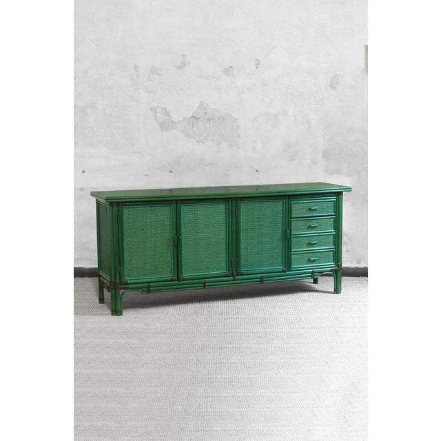 Large green lacquered sideboard, 1980s Product Details Large sideboard made of wood, bamboo, and rattan fabric with...
