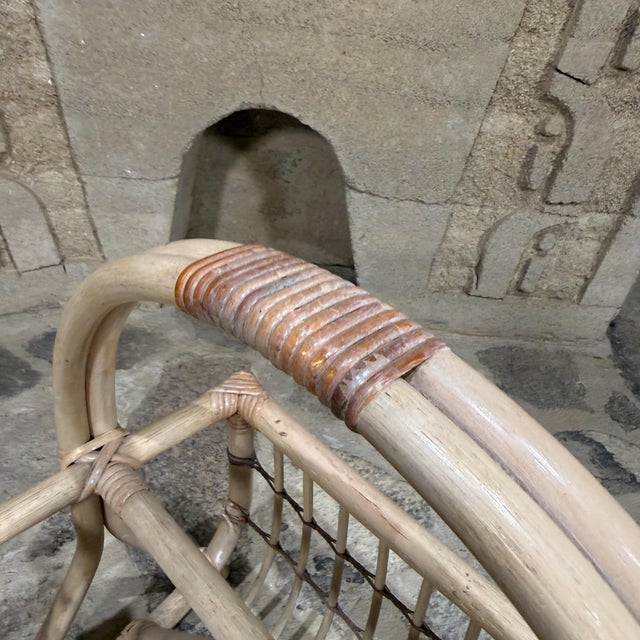 For your consideration, a vintage rattan or bamboo magazine rack. Attributed to designer Franco Albini. Unmarked....