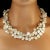 This is part of Chairish’s Fine Jewelry assortment. Elegant Triple Strand White Keshi Pearl Necklace with Blue Zircon...