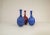 Wonderful blue and red ceramic vases in peacock looking pattern. Designed by sven erik skawonius for upsala ekeby, sweden,...