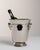 This mid 20th century ice bucket from France is finished in silver. Its form follows honest, well-proportioned lines...