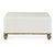 The contemporary high gloss cream lacquered ottoman coffee table featuring mid-century inspired feet, showcases a fusion...