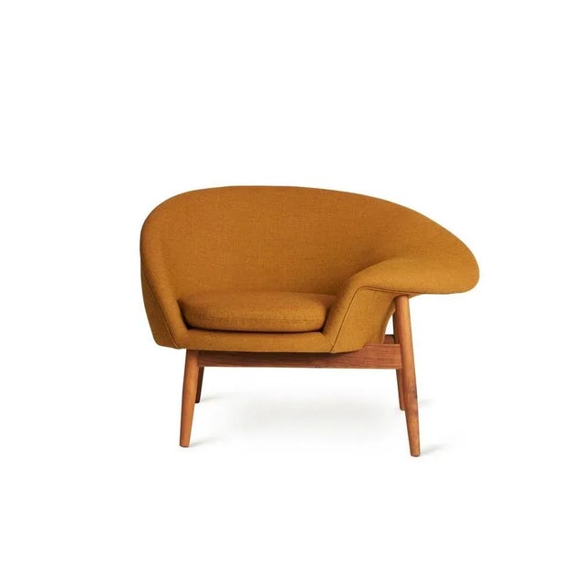 Fried egg right lounge chair dark ochre by warm nordic dimensions: d99 x w68 x h 68 cm material: textile or nubuck...
