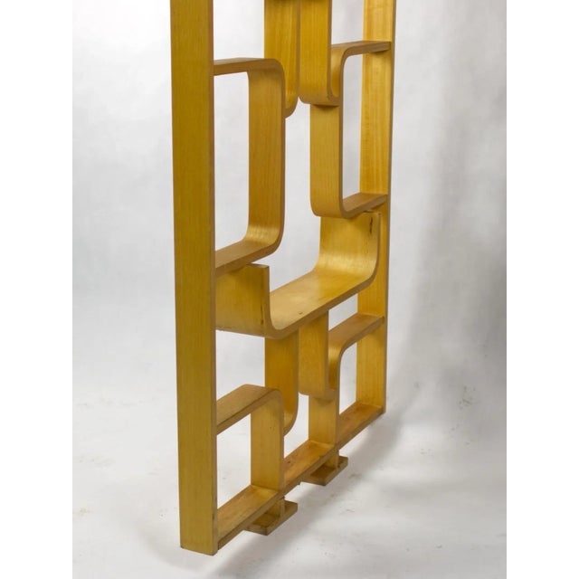 Midcentury wall divider designed by Czech architect, Ludvik Volak and produced by Drevopodnik Holešov in the former...