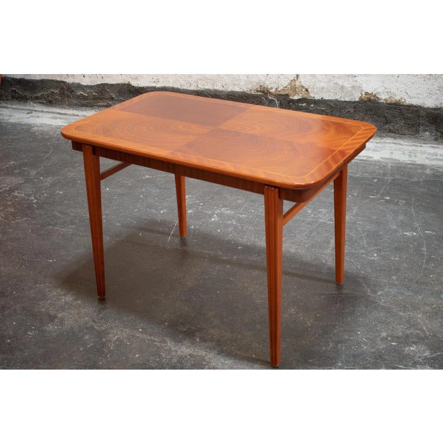 Midcentury Modern end or side table made of mahogany. Known in Sweden as "sofa tables", these tend to be taller than...