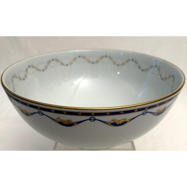 Here is a beautiful porcelain Vista Alegre serving bowl in the Fontainebleau pattern. Hand-painted blue-and-gold designs...