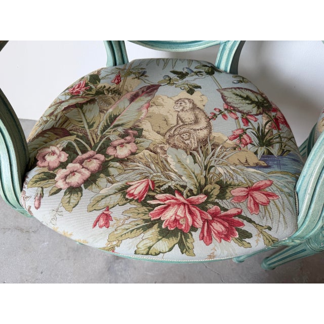 Elegant pair of 1970’s vintage Louis XVI–style oval back armchairs finished in a beautiful distressed aqua / seafoam green...