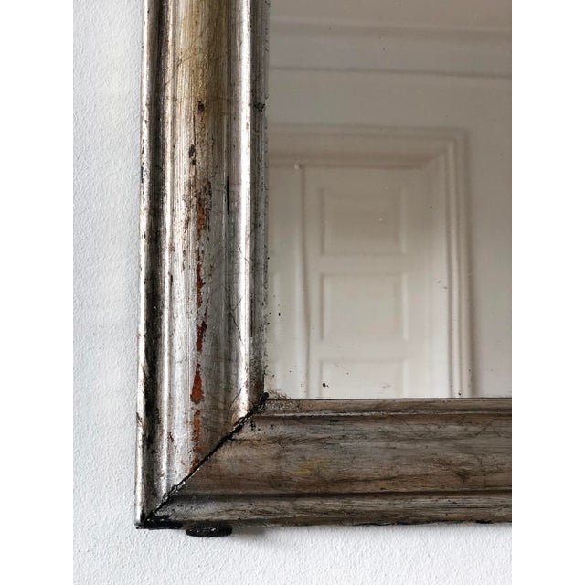 Antique French Louis Philippe silvered mirror, dating to the late 19th century. The mirror is believed to be an apprentice...