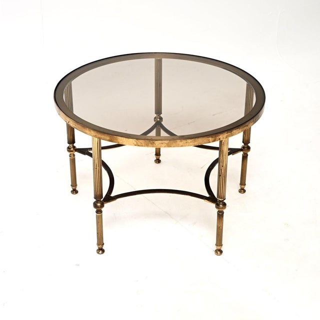 A stylish and extremely well made vintage French brass coffee table, dating from the 1960’s. This is of superb quality and...