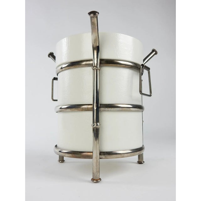 1960's silver plate metal faux bamboo and white vinyl ice bucket. Exceptional quality piece with aged patina on silver....