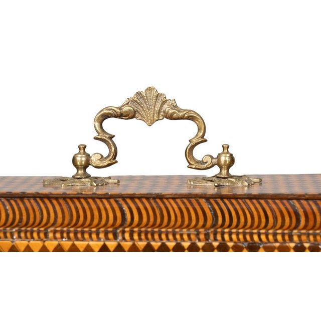 Fine George III parquetry tea caddy. Unusually fine quality with fire gilt rocaille handle and key escutcheon. Interior...