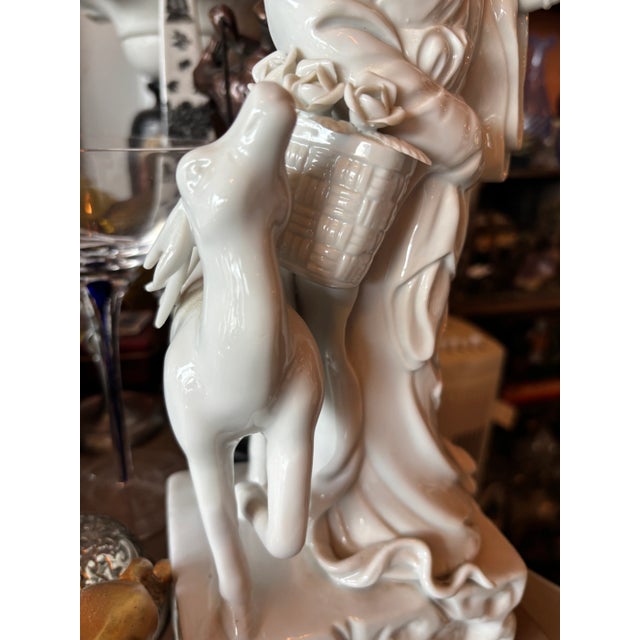 Porcelain Blanc De Chine Magu & Deer Figurine in a White Porcelain .
