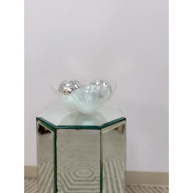 Add a touch of vintage charm and modern elegance to any room with this Vintage Hexagonal Mirror Pedestal. Featuring a...