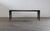 This exceptionally slim and elegant rosewood coffee table is a quintessential piece of 1960s Danish design, bearing the...