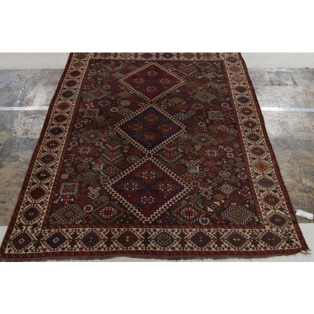 Hand-knotted in smooth, suede-like wool, an antique Qashqai rug originating circa 1920-1930, joining Rug & Kilim’s coveted...