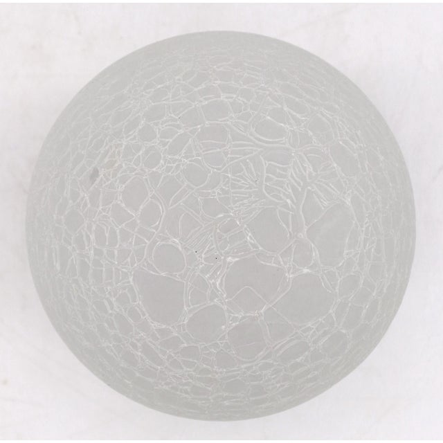 Reclaimed Traditional style ball shaped crackle glass globe flush mount light with a brass fitter. This requires one...
