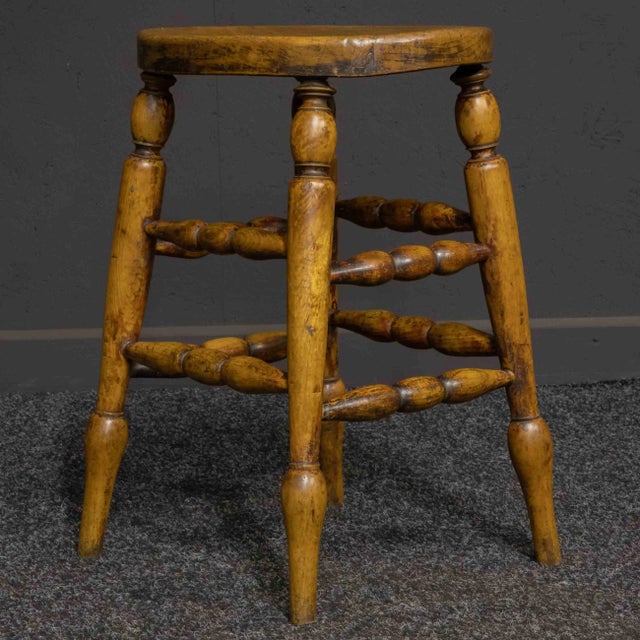 A oval elm topped stool from the Victorian period. The legs and stretchers are a mix of ash and fruitwood. Unusually the...