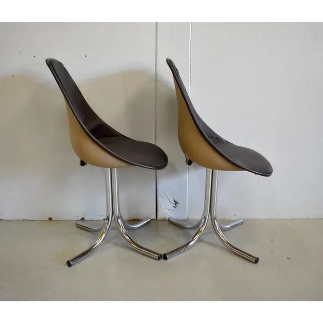 Pair of Chairs inspired by Charles & Ray Eames, Couple Designers Must 60s. They consist of a Canal Mold, beige hue,...