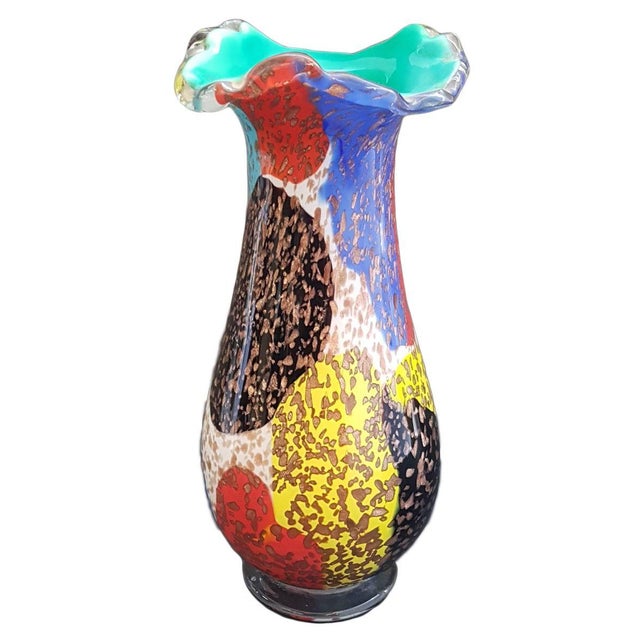 A colourful blown glass vase with aventurine stone by A.Ve.M (Arte Vetraria Muranese), Italy. Aventurine is a variety of...