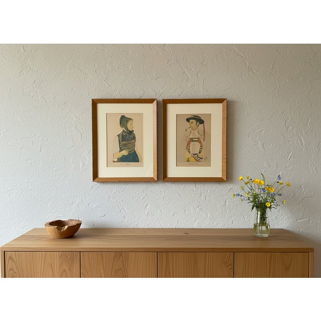 These are signed vintage lithographic prints from a series titled "Costumes Suisses" (Swiss Costumes) created by the Swiss...