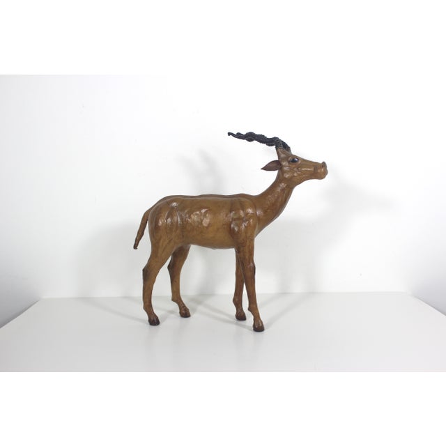 Vintage leather wrapped antelope impala. Very good vintage condition with some marks and minor scratches. Please look at...