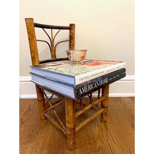 Burnt bamboo with tortoise finish chair. Great as a side table, as an extra spot for a drink or as a plant stand.