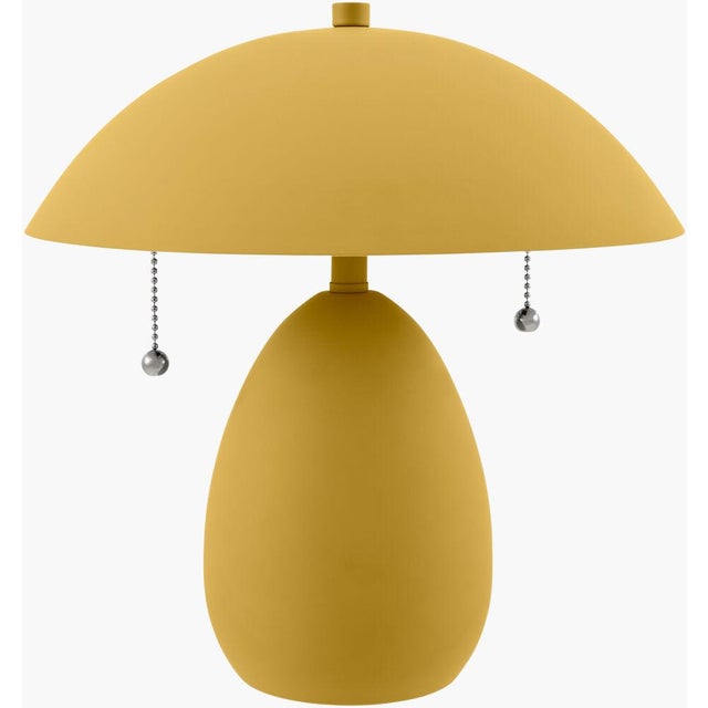 Illuminate your space with the charming allure of the Umberis accent table lamp, a perfect embodiment of traditional...