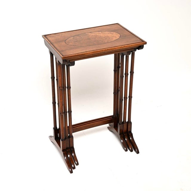 A smart and very useful antique Edwardian walnut nest of tables. They were made in England, they date from around the...