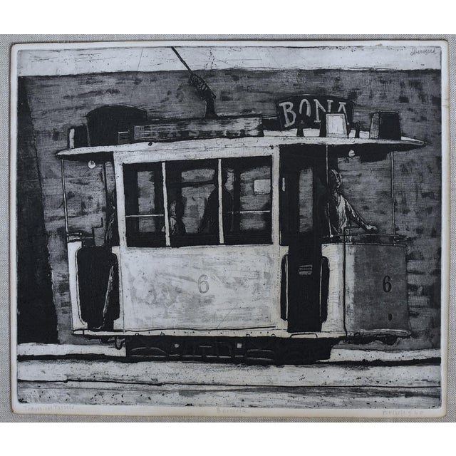 A vintage, signed, framed engraving on paper by Dutch artist Herman (Hermanus) Berserik titled "Train in Tunis" depicting...