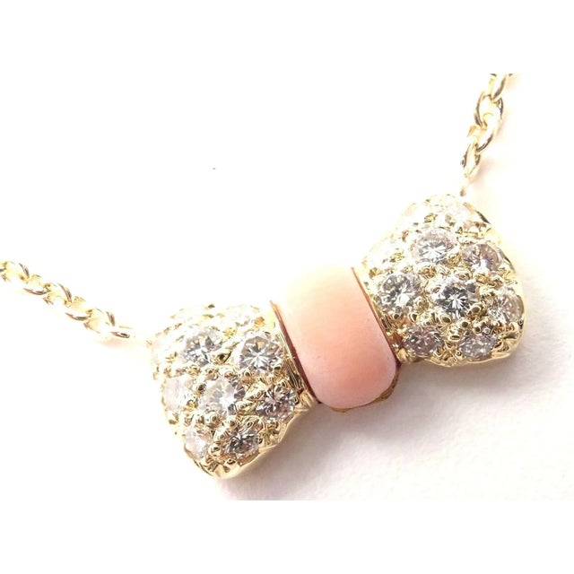 Contemporary Van Cleef & Arpels 18k Yellow Gold Diamond Coral Bow Pendant Necklace For Sale - Image 3 of 8