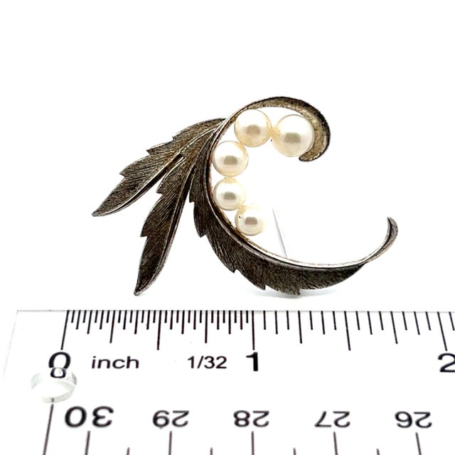 Mikimoto Estate Akoya Pearl Brooch Pin Sterling Silver 5-7 mm 5.1 Grams M410 This elegant Authentic Mikimoto Estate...