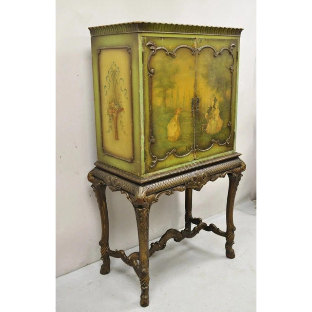 Antique French Renaissance Green Distress Painted Radio Cabinet Bar Cupboard. Item features 2 part construction, carved...
